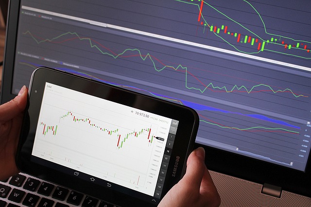 An image showcasing a skilled trader analyzing complex forex charts on multiple screens, employing advanced techniques like Fibonacci retracement, candlestick patterns, and trendlines to maximize profits and unlock the untapped potential of forex trading
