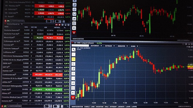 An image showcasing a trader surrounded by multiple screens displaying various forex charts and indicators