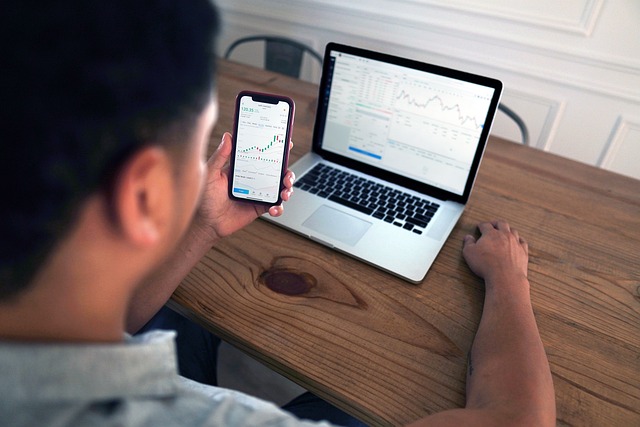 An image showcasing a trader analyzing candlestick charts on a laptop during the weekend, surrounded by indicators and trend lines, emphasizing the significance of technical analysis in boosting profits in forex trading