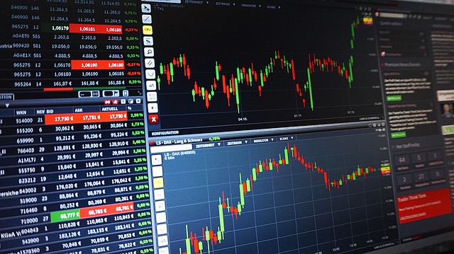 An image featuring a close-up of a trader's hands skillfully analyzing candlestick charts on a computer screen, surrounded by various technical analysis tools like trend lines, moving averages, and support/resistance levels